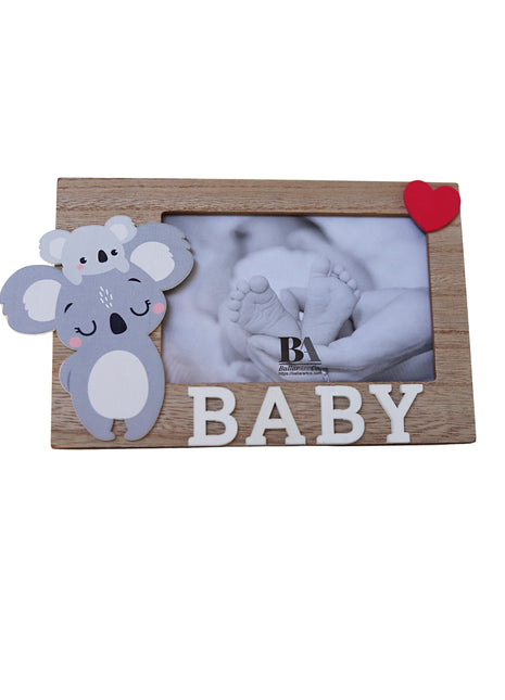 A charming wooden baby photo frame featuring an adorable koala design, perfect for displaying cherished baby photos. This whimsical frame is an ideal home decor piece for any nursery or living room, making it a thoughtful gift for new parents or families with babies. This baby photo frame makes a wonderful gift for baby showers or any special occasion, combining functionality and cute design to celebrate the arrival of a new baby. 2
