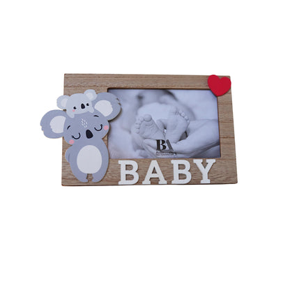 A charming wooden baby photo frame featuring an adorable koala design, perfect for displaying cherished baby photos. This whimsical frame is an ideal home decor piece for any nursery or living room, making it a thoughtful gift for new parents or families with babies. This baby photo frame makes a wonderful gift for baby showers or any special occasion, combining functionality and cute design to celebrate the arrival of a new baby. 2
