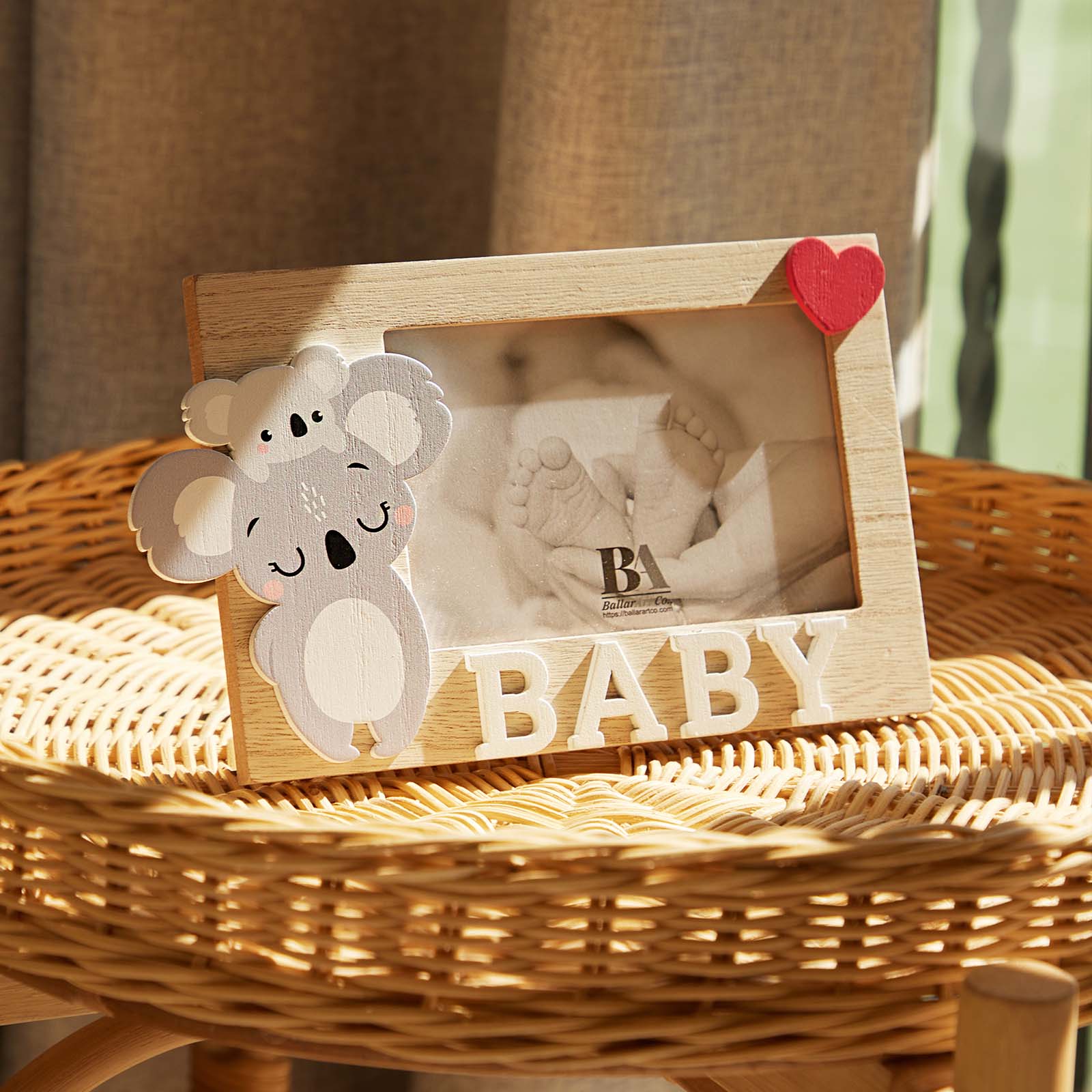 A charming wooden baby photo frame featuring an adorable koala design, perfect for displaying cherished baby photos. This whimsical frame is an ideal home decor piece for any nursery or living room, making it a thoughtful gift for new parents or families with babies. This baby photo frame makes a wonderful gift for baby showers or any special occasion, combining functionality and cute design to celebrate the arrival of a new baby. 3
