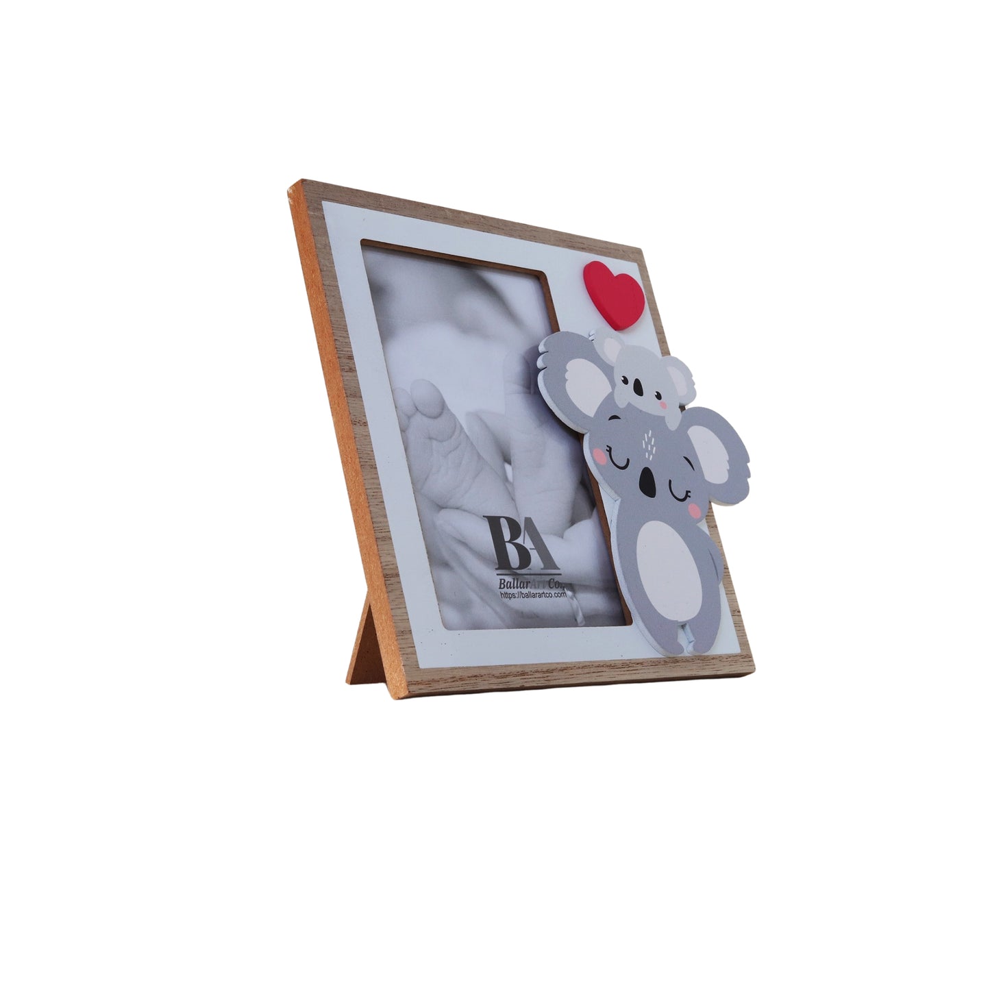 A charming wooden baby photo frame featuring an adorable koala design, perfect for displaying cherished baby photos. This whimsical frame is an ideal home decor piece for any nursery or living room, making it a thoughtful gift for new parents or families with babies. This baby photo frame makes a wonderful gift for baby showers or any special occasion, combining functionality and cute design to celebrate the arrival of a new baby. 5
