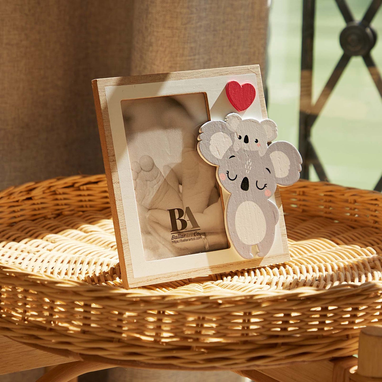 A charming wooden baby photo frame featuring an adorable koala design, perfect for displaying cherished baby photos. This whimsical frame is an ideal home decor piece for any nursery or living room, making it a thoughtful gift for new parents or families with babies. This baby photo frame makes a wonderful gift for baby showers or any special occasion, combining functionality and cute design to celebrate the arrival of a new baby. 6
