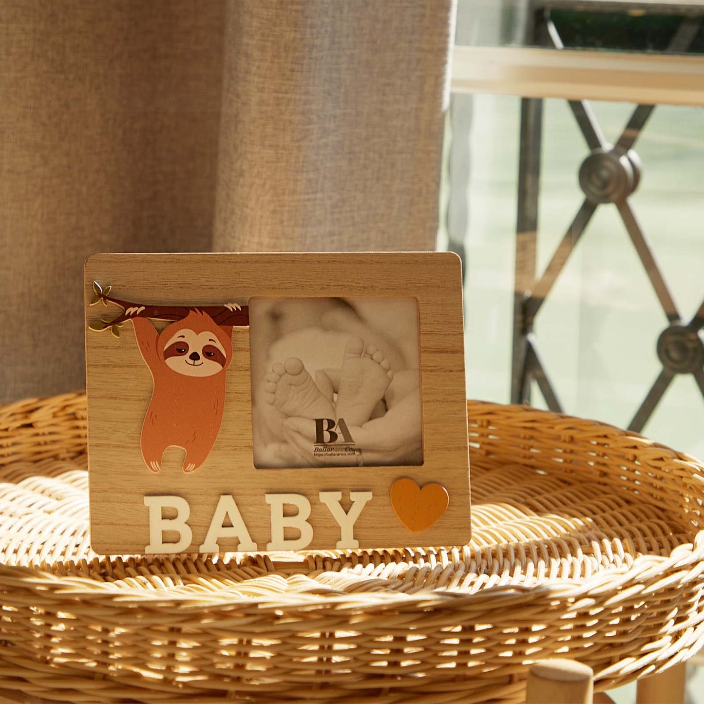 A charming wooden baby photo frame featuring an adorable sloth design, perfect for displaying cherished baby photos. This whimsical frame is an ideal home decor piece for any nursery or living room, making it a thoughtful gift for new parents or families with babies. With its cute sloth illustration and durable wooden construction, it adds a playful touch to any room while preserving precious memories. This baby photo frame makes a wonderful gift for baby showers or any special occasion, combining functiona