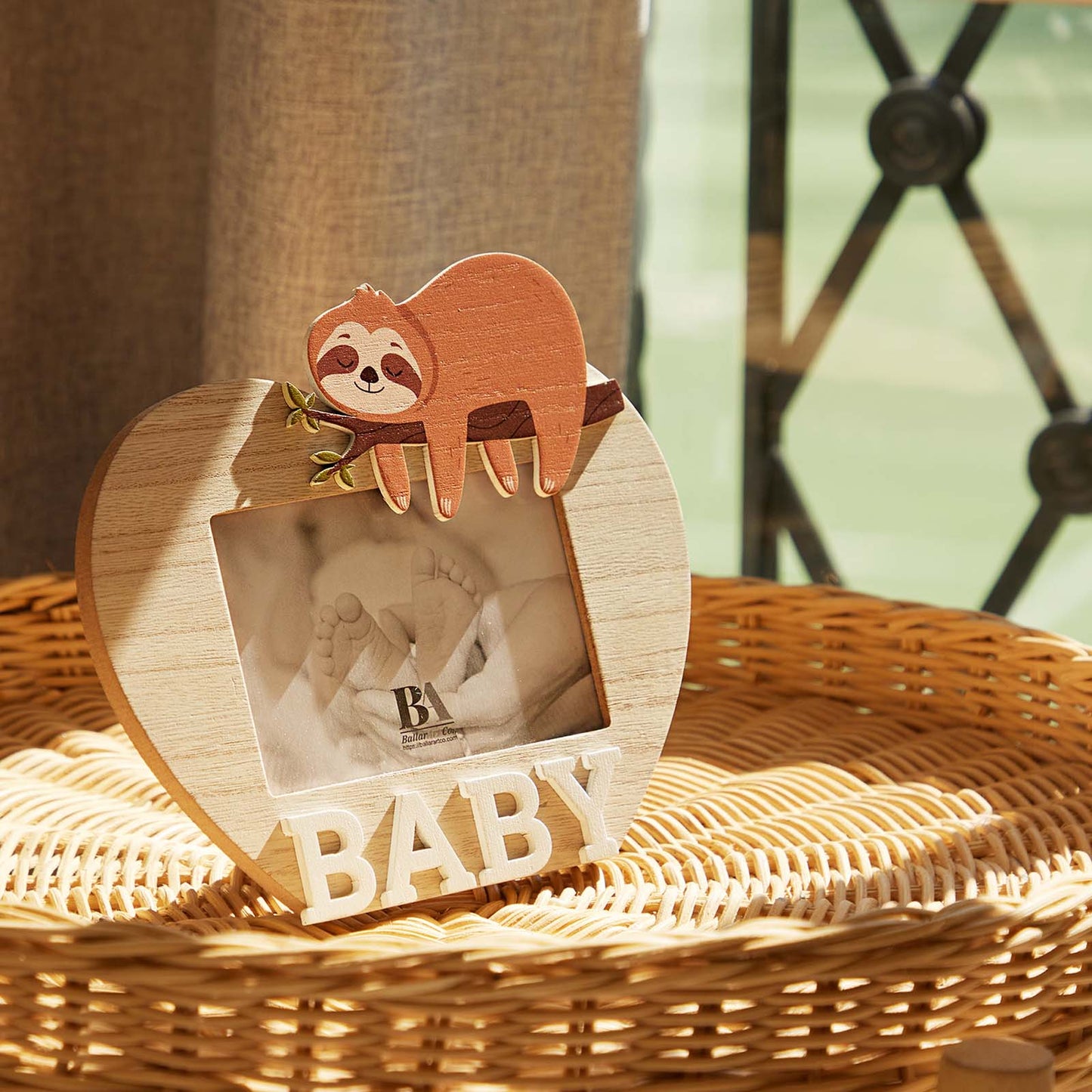 A charming wooden baby photo frame featuring an adorable sloth design, perfect for displaying cherished baby photos. This whimsical frame is an ideal home decor piece for any nursery or living room, making it a thoughtful gift for new parents or families with babies. With its cute sloth illustration and durable wooden construction, it adds a playful touch to any room while preserving precious memories. This baby photo frame makes a wonderful gift for baby showers or any special occasion, combining functiona