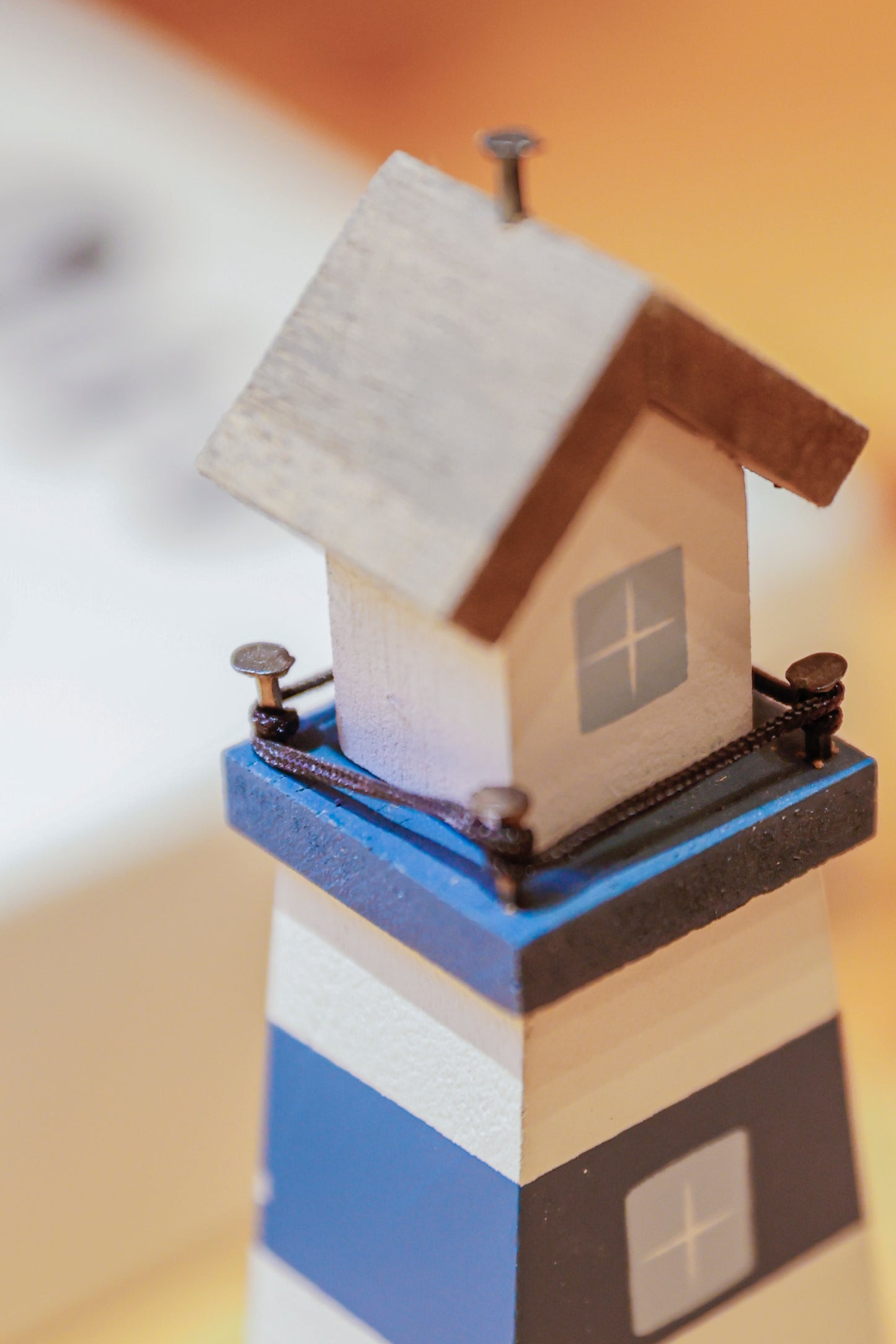 Charming coastal cottage miniature house decor, Lighthouse-shaped room decor in a beautiful seaside style, featuring a blue color scheme and intricate wooden design. This elegant home ornament adds a coastal vibe to any space, perfect for living rooms, offices, or as a gift for beach lovers. 5
