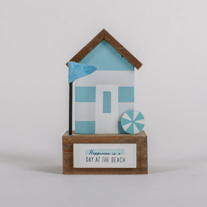 Charming coastal cottage miniature house decor in a beautiful seaside style, Happiness is a Day at the Beach ,featuring a blue color scheme and intricate wooden design. This elegant home ornament adds a coastal vibe to any space, perfect for living rooms, offices, or as a gift for beach lovers. 1
