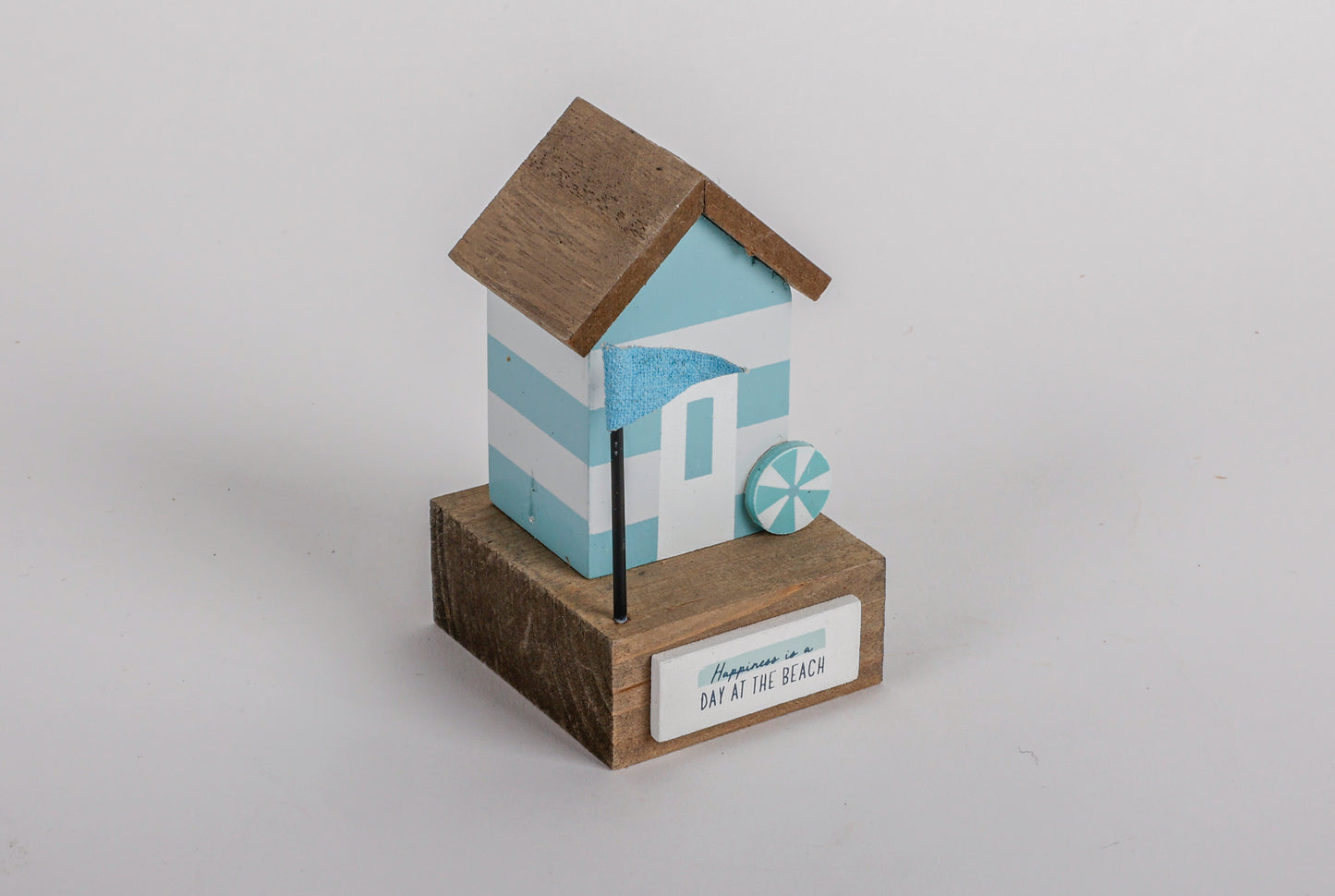 Charming coastal cottage miniature house decor in a beautiful seaside style, Happiness is a Day at the Beach ,featuring a blue color scheme and intricate wooden design. This elegant home ornament adds a coastal vibe to any space, perfect for living rooms, offices, or as a gift for beach lovers. 6
