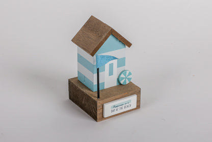 Charming coastal cottage miniature house decor in a beautiful seaside style, Happiness is a Day at the Beach ,featuring a blue color scheme and intricate wooden design. This elegant home ornament adds a coastal vibe to any space, perfect for living rooms, offices, or as a gift for beach lovers. 6
