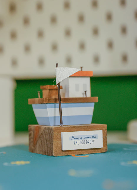 Charming coastal cottage miniature house decor in a beautiful seaside style, Home is Where the Anchor Drops ,featuring a blue color scheme and intricate wooden design. This elegant home ornament adds a coastal vibe to any space, perfect for living rooms, offices, or as a gift for beach lovers. 2
