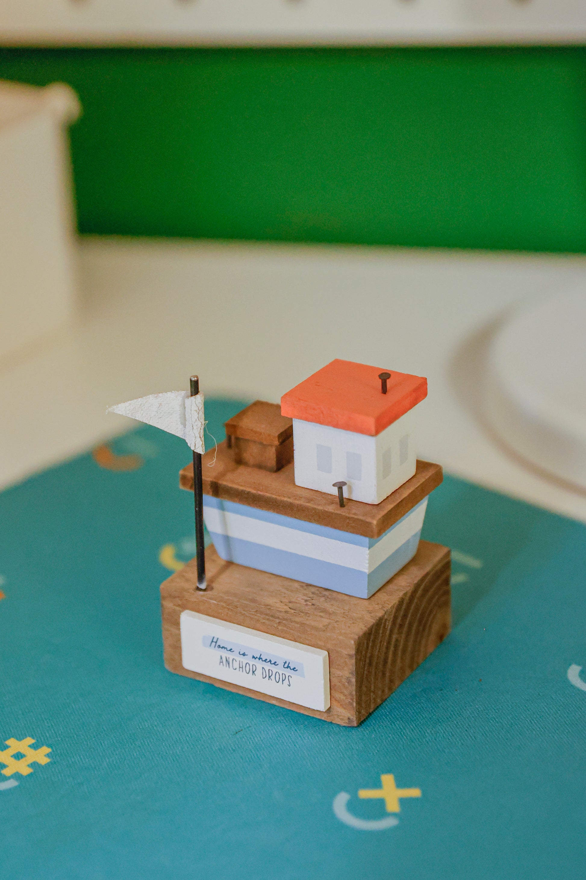 Charming coastal cottage miniature house decor in a beautiful seaside style, Home is Where the Anchor Drops ,featuring a blue color scheme and intricate wooden design. This elegant home ornament adds a coastal vibe to any space, perfect for living rooms, offices, or as a gift for beach lovers. 4
