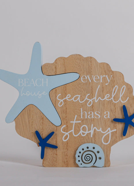 Charming coastal cottage seashell shaped house decor in a beautiful seaside style, featuring a blue color scheme and intricate wooden design. This elegant home ornament adds a coastal vibe to any space, perfect for living rooms, offices, or as a gift for beach lovers. 1
