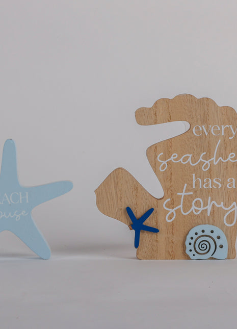 Charming coastal cottage seashell shaped house decor in a beautiful seaside style, featuring a blue color scheme and intricate wooden design. This elegant home ornament adds a coastal vibe to any space, perfect for living rooms, offices, or as a gift for beach lovers. 2
