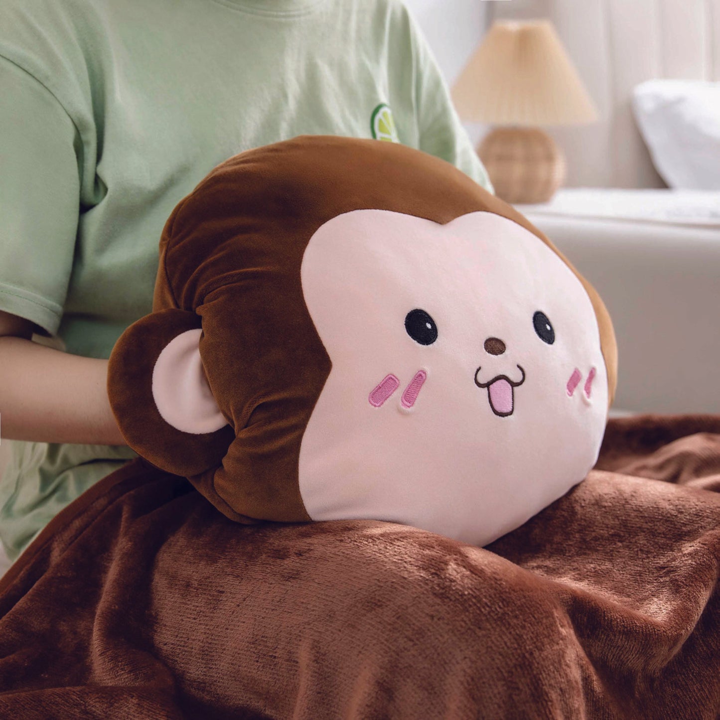 Adorable monkey plush toy, cartoon monkey stuffed toy with a soft blanket inside and a hand-warmer feature in its belly. This multi-functional stuffed animal offers comfort and warmth. Soft and cuddly, this squishmallow-style stuffed animal doubles as a pillow for kids, making it the perfect plushie and comfort companion for bedtime or playtime. 4
