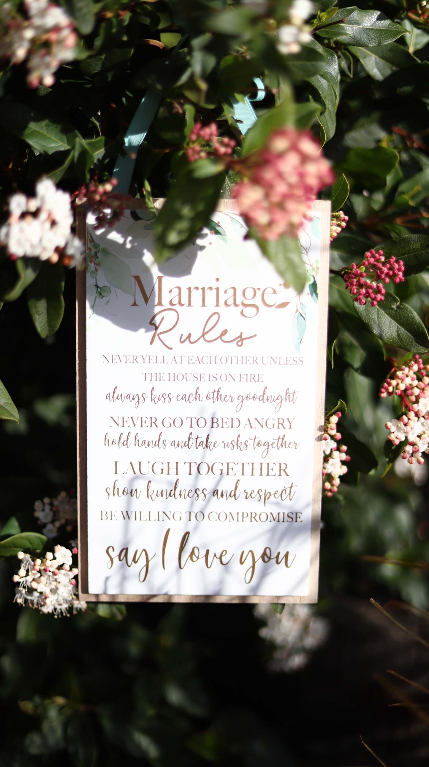 Elegant wooden hanging room decor featuring "Marriage Rules" with beautifully designed typography, perfect as a wedding gift or anniversary keepsake for newlyweds, adding a charming and sentimental touch to their home. Ideal for displaying in living rooms, bedrooms, or kitchens to celebrate love and marriage. 10
