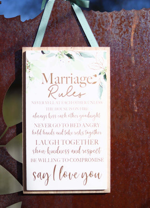 Elegant wooden hanging room decor featuring "Marriage Rules" with beautifully designed typography, perfect as a wedding gift or anniversary keepsake for newlyweds, adding a charming and sentimental touch to their home. Ideal for displaying in living rooms, bedrooms, or kitchens to celebrate love and marriage. 12
