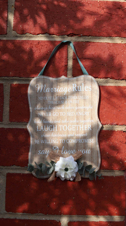 Elegant wooden hanging room decor featuring "Marriage Rules" with beautifully designed typography, perfect as a wedding gift or anniversary keepsake for newlyweds, adding a charming and sentimental touch to their home. Ideal for displaying in living rooms, bedrooms, or kitchens to celebrate love and marriage. 2
