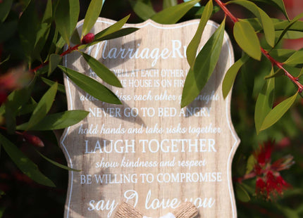 Elegant wooden hanging room decor featuring "Marriage Rules" with beautifully designed typography, perfect as a wedding gift or anniversary keepsake for newlyweds, adding a charming and sentimental touch to their home. Ideal for displaying in living rooms, bedrooms, or kitchens to celebrate love and marriage. 3
