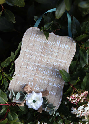 Elegant wooden hanging room decor featuring "Marriage Rules" with beautifully designed typography, perfect as a wedding gift or anniversary keepsake for newlyweds, adding a charming and sentimental touch to their home. Ideal for displaying in living rooms, bedrooms, or kitchens to celebrate love and marriage. 4
