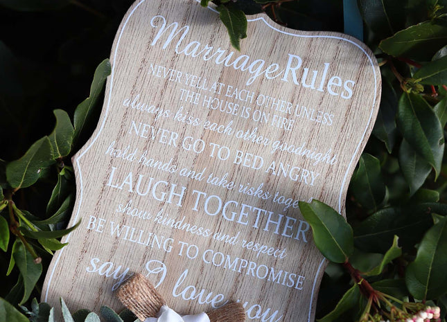 Elegant wooden hanging room decor featuring "Marriage Rules" with beautifully designed typography, perfect as a wedding gift or anniversary keepsake for newlyweds, adding a charming and sentimental touch to their home. Ideal for displaying in living rooms, bedrooms, or kitchens to celebrate love and marriage. 4
