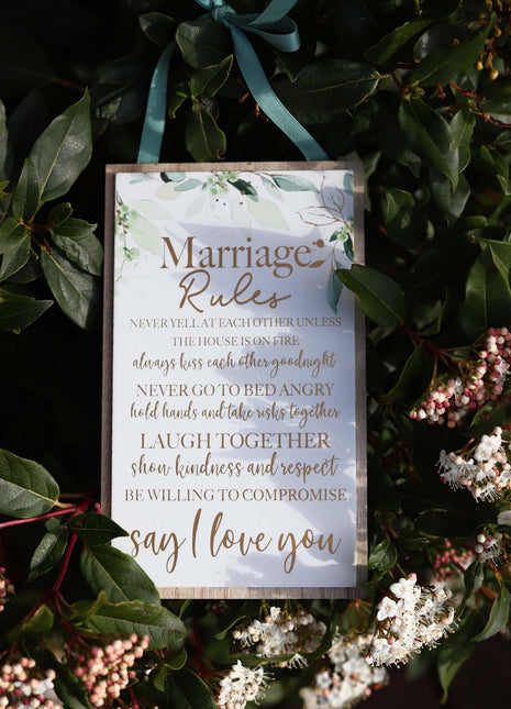 Elegant wooden hanging room decor featuring "Marriage Rules" with beautifully designed typography, perfect as a wedding gift or anniversary keepsake for newlyweds, adding a charming and sentimental touch to their home. Ideal for displaying in living rooms, bedrooms, or kitchens to celebrate love and marriage. 9
