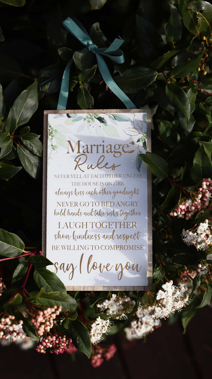 Elegant wooden hanging room decor featuring "Marriage Rules" with beautifully designed typography, perfect as a wedding gift or anniversary keepsake for newlyweds, adding a charming and sentimental touch to their home. Ideal for displaying in living rooms, bedrooms, or kitchens to celebrate love and marriage. 9
