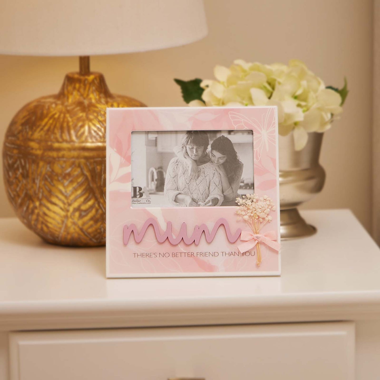 Beautiful pink wooden photo frame with elegant design, perfect for Mother's Day or as a thoughtful gift for any occasion, celebrating mom. The frame's refined style makes it an ideal home decor piece, adding a personal and heartfelt touch to any room. Perfect for displaying cherished memories of loved ones. 3
