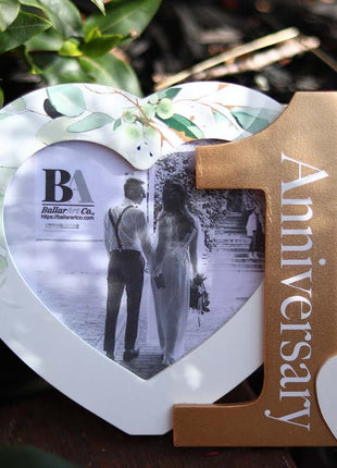 Heart-shaped photo frame featuring the word "Anniversary" and the number 1, a perfect romantic gift for couples celebrating their first anniversary, capturing cherished memories as a keepsake. 4
