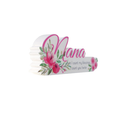 A charming floral vase featuring the word "Nana" in beautiful lettering, surrounded by vibrant flowers. This elegant home decor piece is designed as a thoughtful gift for grandma, perfect for birthdays, holidays, or any special occasion. The floral details and personalized "Nana" text make it a meaningful and heartfelt present, adding warmth and beauty to her home. Ideal for showing love and appreciation, this vase serves as both a decorative ornament and a lasting reminder of your special bond with your gr