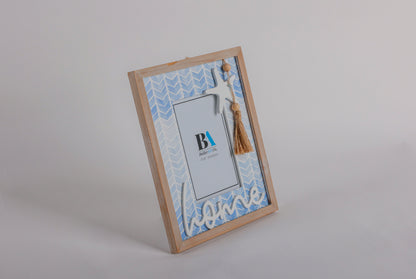 Beautiful ocean-themed 4x6 photo frame with a starfish decoration, featuring a blue coastal design. Perfect for adding a seaside charm to your home decor or showcasing cherished memories in a beach-inspired style. Ideal as a stylish room decoration or gift for ocean lovers. 2
