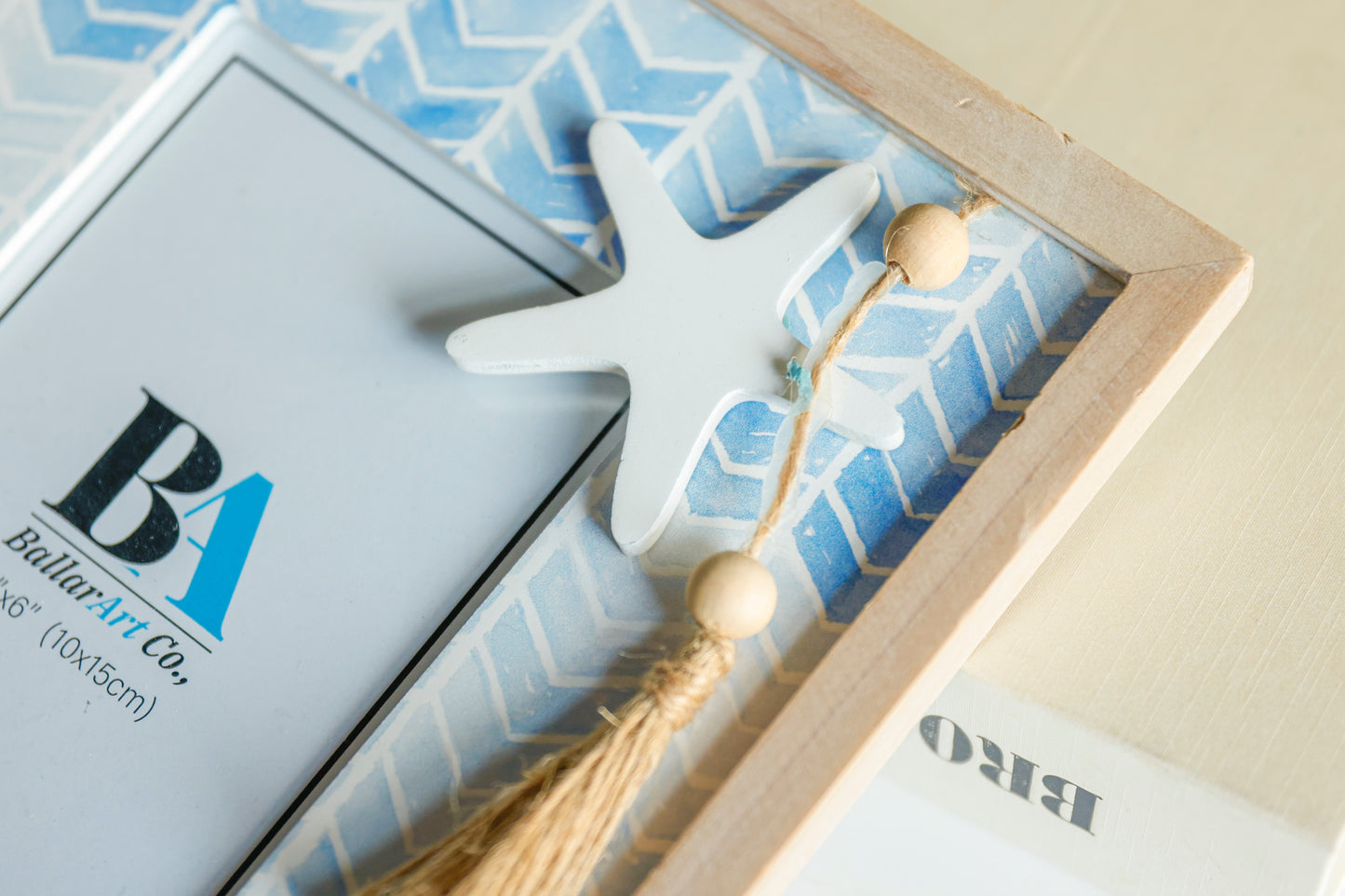 Beautiful ocean-themed 4x6 photo frame with a starfish decoration, featuring a blue coastal design. Perfect for adding a seaside charm to your home decor or showcasing cherished memories in a beach-inspired style. Ideal as a stylish room decoration or gift for ocean lovers. 4
