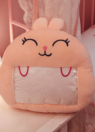 Adorable pink bunny plush toy, cartoon rabbit stuffed toy with a soft blanket inside and a hand-warmer feature in its belly. This multi-functional stuffed animal offers comfort and warmth. Soft and cuddly, this squishmallow-style stuffed animal doubles as a pillow for kids, making it the perfect plushie and comfort companion for bedtime or playtime. 5
