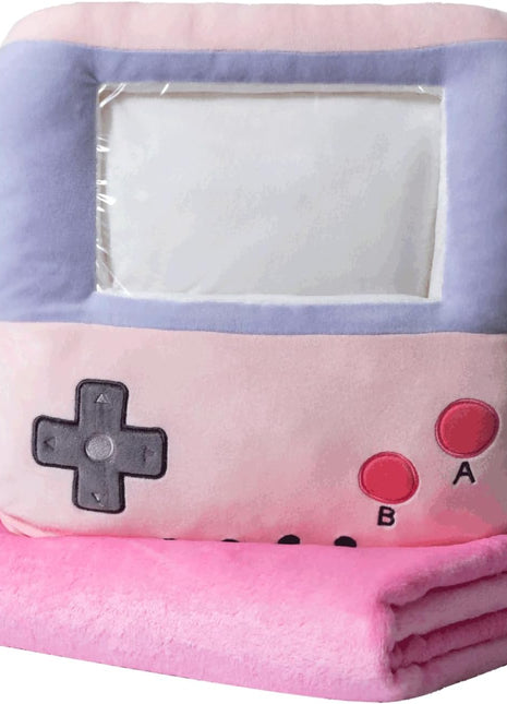 Adorable pink game console-shaped plush toy with a soft blanket inside and a hand-warmer feature in its belly. This multi-functional stuffed animal offers comfort and warmth, making it a perfect squishmallow-style throw pillow or plushie for cozy relaxation. 1
