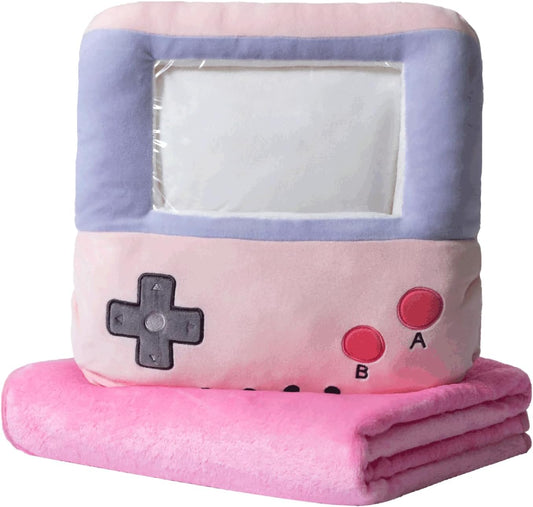 Adorable pink game console-shaped plush toy with a soft blanket inside and a hand-warmer feature in its belly. This multi-functional stuffed animal offers comfort and warmth, making it a perfect squishmallow-style throw pillow or plushie for cozy relaxation. 1
