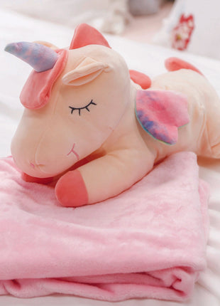 Adorable pink unicorn plush toy with rainbow wings, featuring a cozy unicorn blanket tucked inside its belly. Soft and cuddly, this squishmallow-style stuffed animal doubles as a pillow for kids, making it the perfect plushie and comfort companion for bedtime or playtime. 3
