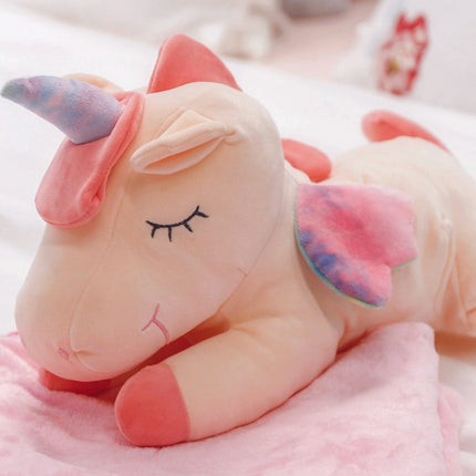 Adorable pink unicorn plush toy with rainbow wings, featuring a cozy unicorn blanket tucked inside its belly. Soft and cuddly, this squishmallow-style stuffed animal doubles as a pillow for kids, making it the perfect plushie and comfort companion for bedtime or playtime. 3

