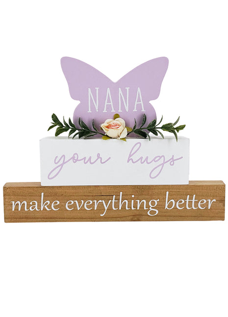 A beautifully designed purple butterfly-shaped ornament for grandma, adorned with vibrant floral details. This charming home decor piece is perfect for birthdays, holidays, or any special occasion. It serves as both a thoughtful gift and a delightful addition to grandma’s home. The elegant butterfly shape combined with delicate flowers makes it a meaningful token of love and appreciation, ideal for brightening her living space and reminding her of the special bond you share. A perfect choice to show your ca