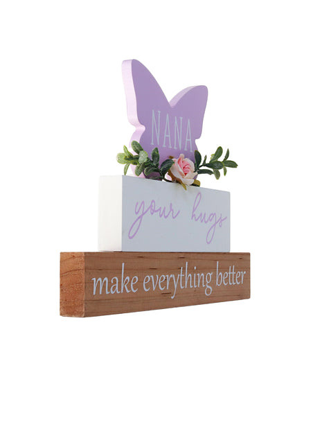 A beautifully designed purple butterfly-shaped ornament for grandma, adorned with vibrant floral details. This charming home decor piece is perfect for birthdays, holidays, or any special occasion. It serves as both a thoughtful gift and a delightful addition to grandma’s home. The elegant butterfly shape combined with delicate flowers makes it a meaningful token of love and appreciation, ideal for brightening her living space and reminding her of the special bond you share. A perfect choice to show your ca
