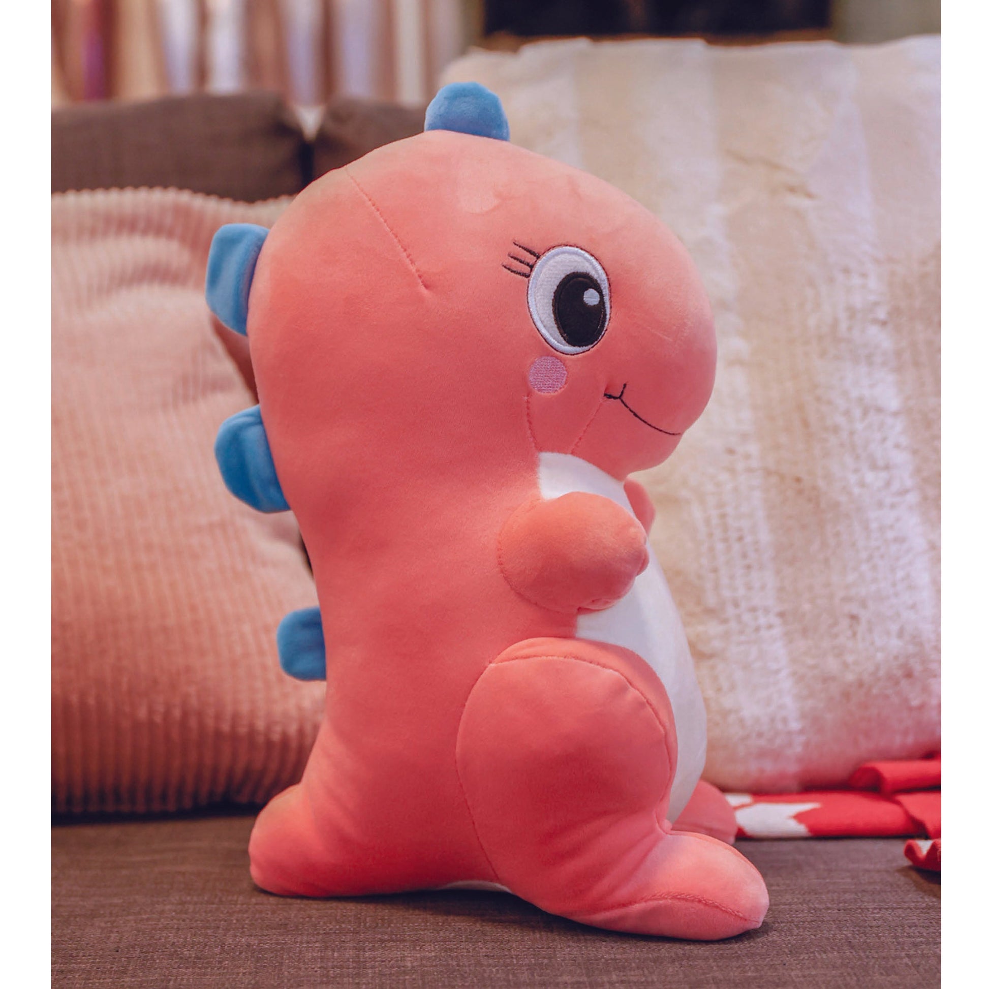 Adorable red dinosaur plush toy, soft and squishy, perfect for cuddling. This cute dinosaur stuffed animal doubles as a pillow for kids, making it an ideal plushie for playtime or bedtime. A must-have for dinosaur lovers and fans of squishmallow-style toys. 5
