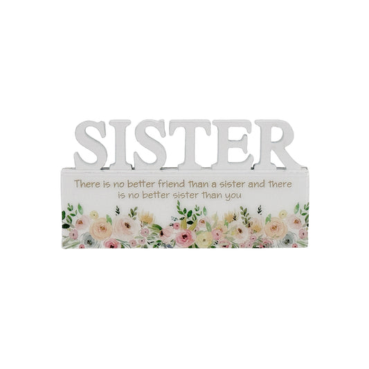 A charming white decorative ornament featuring the word "Sister" with beautiful floral patterns, making it an ideal home decor gift for your sister. The delicate floral design adds a touch of elegance and warmth, making it a perfect gift for birthdays, holidays, or any special occasion. This meaningful ornament symbolizes the love and connection shared between siblings and serves as a reminder of cherished moments. The simple yet elegant white color complements any home decor style, creating a heartfelt and