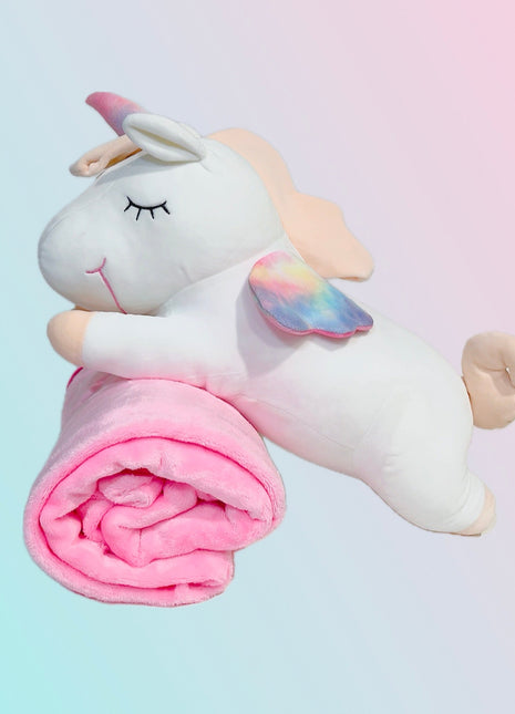 Adorable white unicorn plush toy with rainbow wings, featuring a cozy unicorn blanket tucked inside its belly. Soft and cuddly, this squishmallow-style stuffed animal doubles as a pillow for kids, making it the perfect plushie and comfort companion for bedtime or playtime. 2
