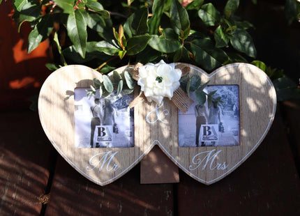 Wooden double photo frame featuring two interlocking hearts, each holding a photo, and adorned with a white flower. A perfect romantic gift for couples, weddings, or anniversaries, symbolizing love and togetherness. 4
