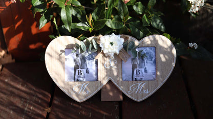 Wooden double photo frame featuring two interlocking hearts, each holding a photo, and adorned with a white flower. A perfect romantic gift for couples, weddings, or anniversaries, symbolizing love and togetherness. 4
