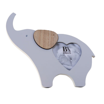 Wooden elephant-shaped baby photo frame with a photo slot in the belly, crafted as a charming home decor piece and keepsake, perfect for displaying baby pictures and enhancing nursery or home spaces. 1
